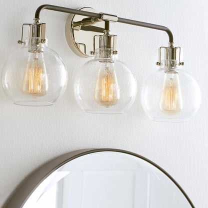 Lifestyle Shot of Clara Vanity, 3-Light Vanity, Polished Nickel, Textured Black, Clear Seeded Glass